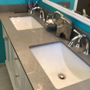 Quartz double sink counter top w/ back splash!